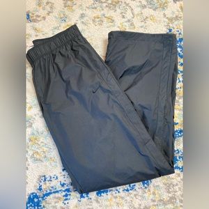 Nike black joggers pants elastic waist front pockets drawstring pant cuffs med